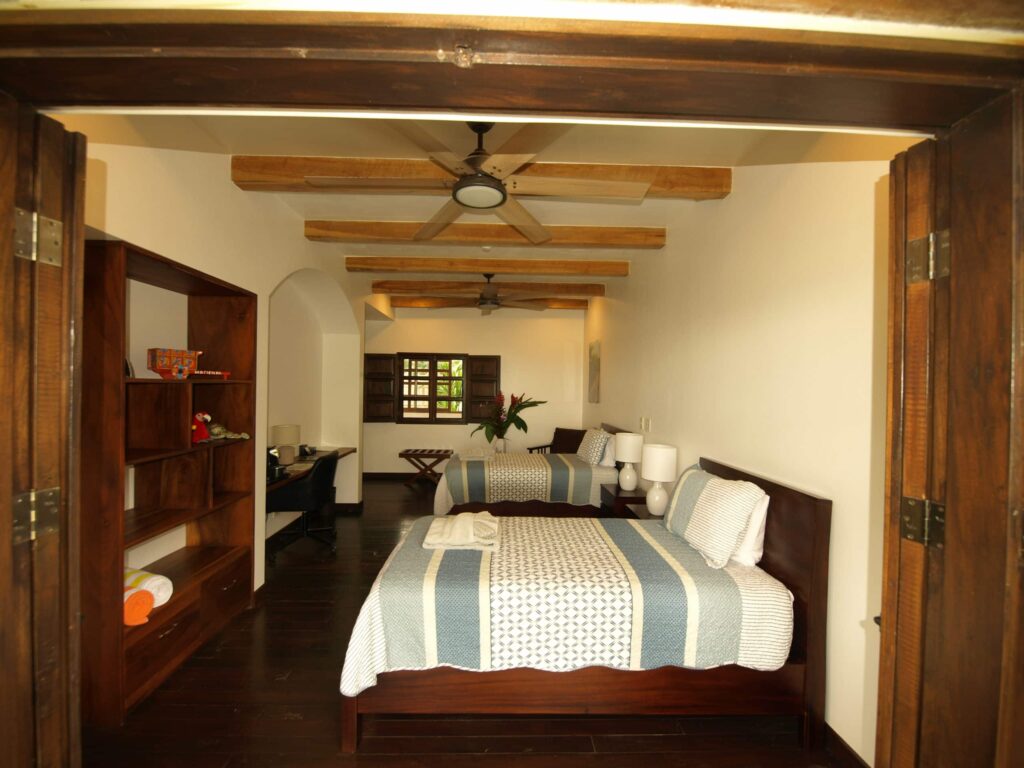View from a colonial twin room at Hacienda Las Vainillas onto the rainforest