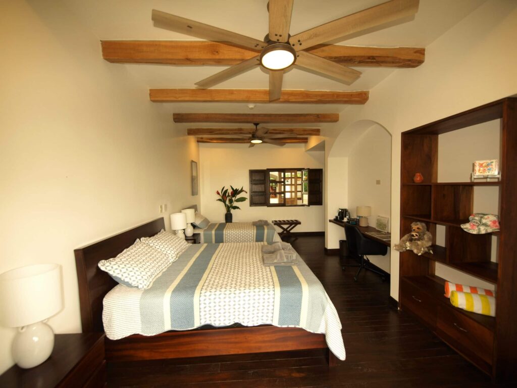 Don Amerigo ground-floor colonial twin room at Hacienda Las Vainillas with private terrace