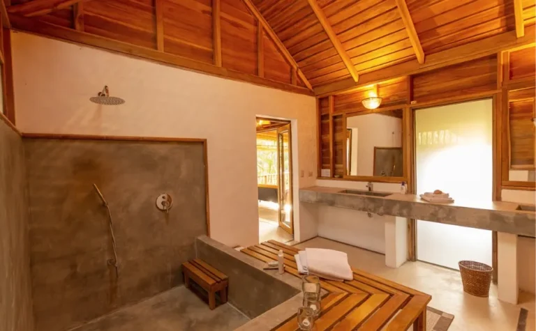 Private en-suite bathroom in a wooden villa at Calamocha Lodge, Costa Rica