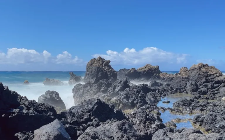 Tide pools and smooth volcanic rocks on the Pacific shore near Manzanillo, Costa Rica