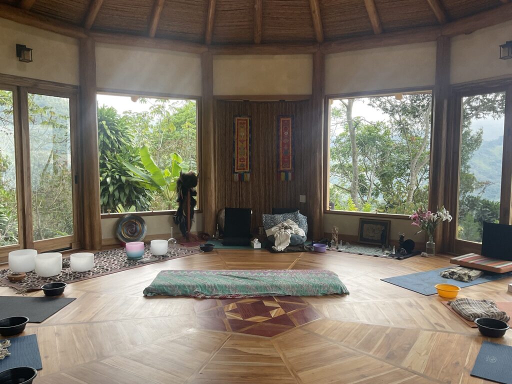 Meditation temple set with crystal singing bowls, cushions and mats before a morning session, Costa Rica
