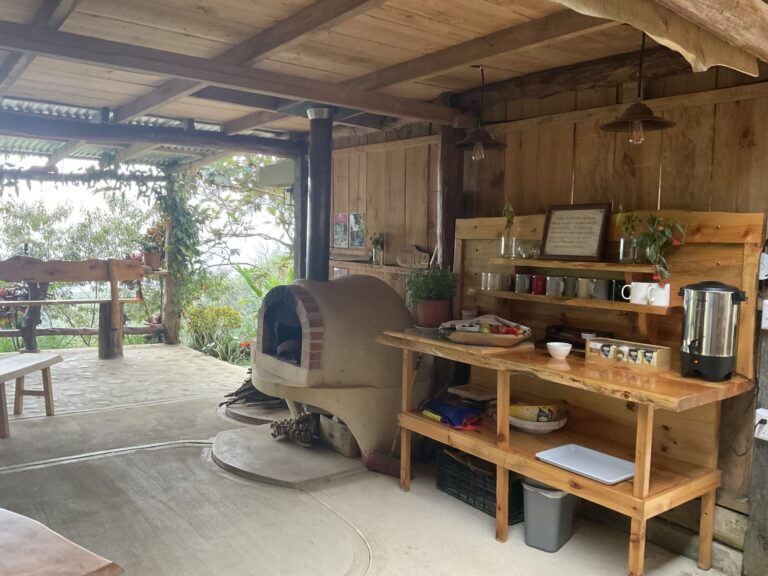 Open-air tea and coffee station beside the wood-fired oven at the retreat centre, Costa Rica