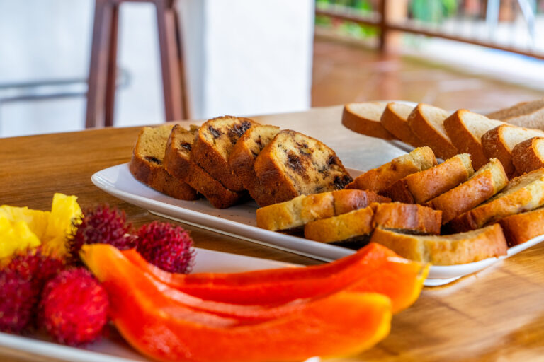 Fresh papaya, rambutan and home-baked bread served at breakfast, Costa Rica retreat