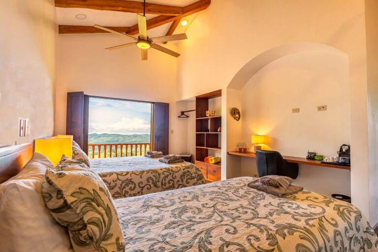 Don Vasco room with two beds, vaulted ceiling and a window onto the valley, Hacienda Las Vainillas Costa Rica