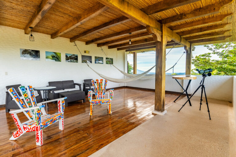 Covered terrace with hammock and telescope looking out over the canopy, Costa Rica