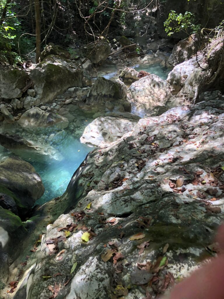 Small river cascade over pale rocks in the forest, Nicoya Peninsula, Costa Rica