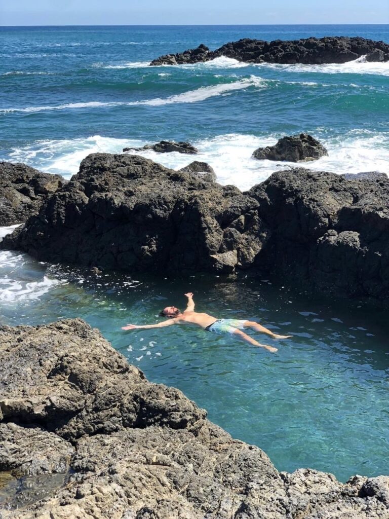 Swimming in a calm tide pool sheltered from the Pacific waves, Manzanillo, Costa Rica