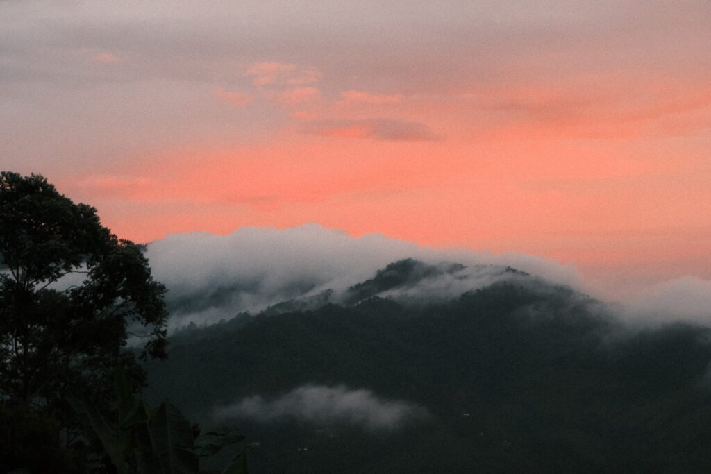 Pink sky over misty mountains, Dharma Vida, Costa Rica